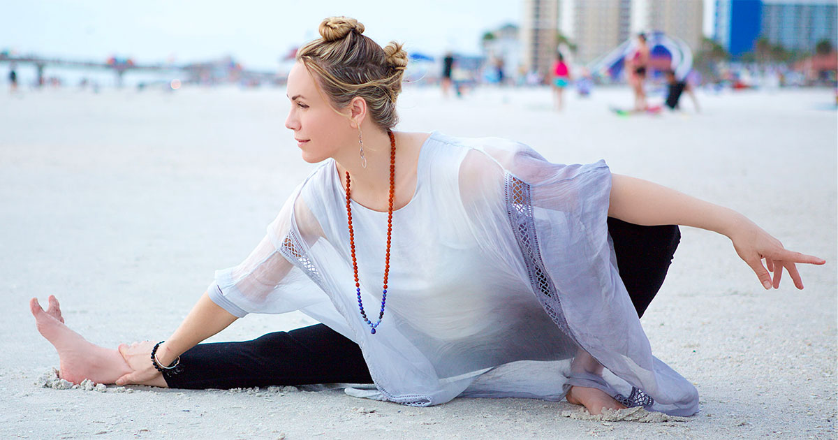 homepage workshops rae posing on beach